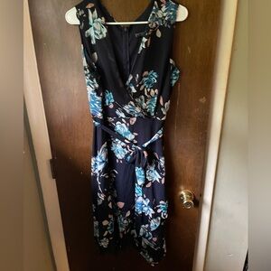 Floral sleeveless dress with handkerchief bottom